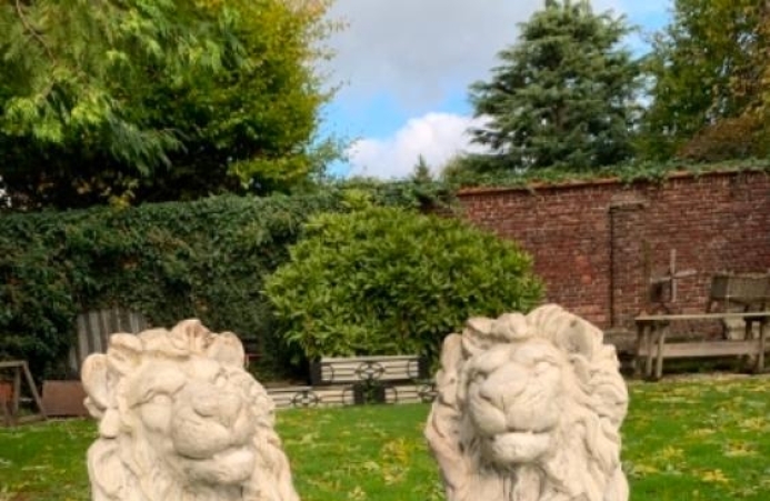 Pair of limestone Lions mid XXth