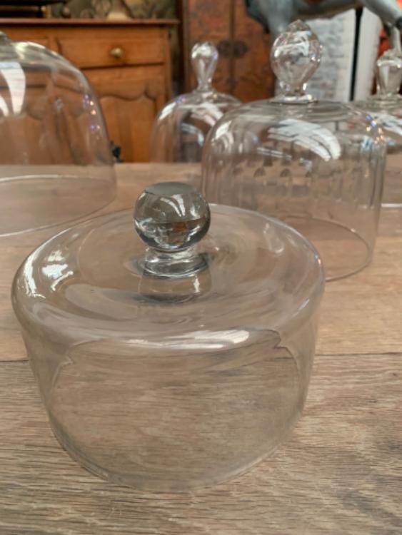 Set of glass cloches, all with age. 
