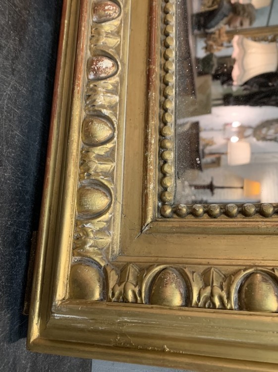 Gilt Louis Philippe mirror with gadroon decor,  mid XIXth