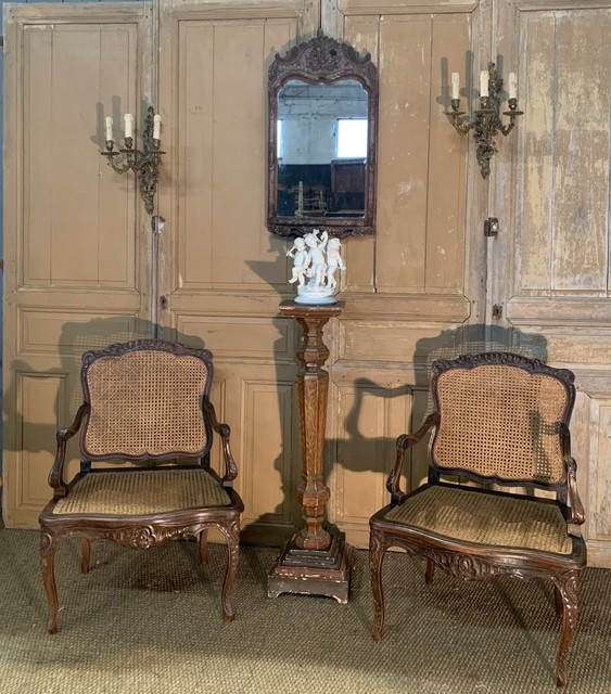 Pair of caned chairs in fruitwood, c.1850